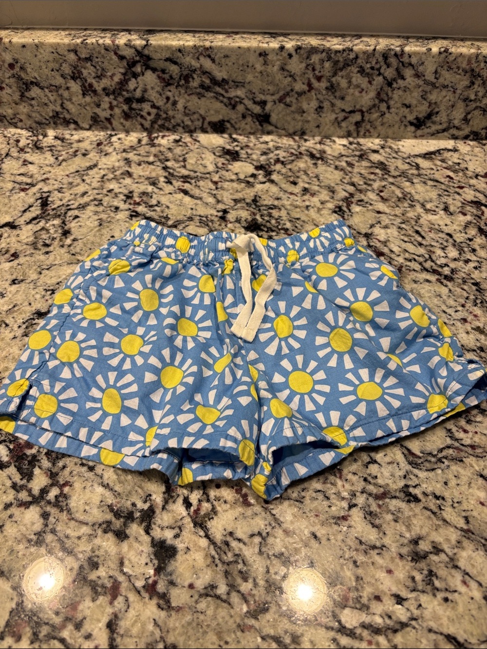 Primary Light Blue Shorts with Yellow and White Daisy Print